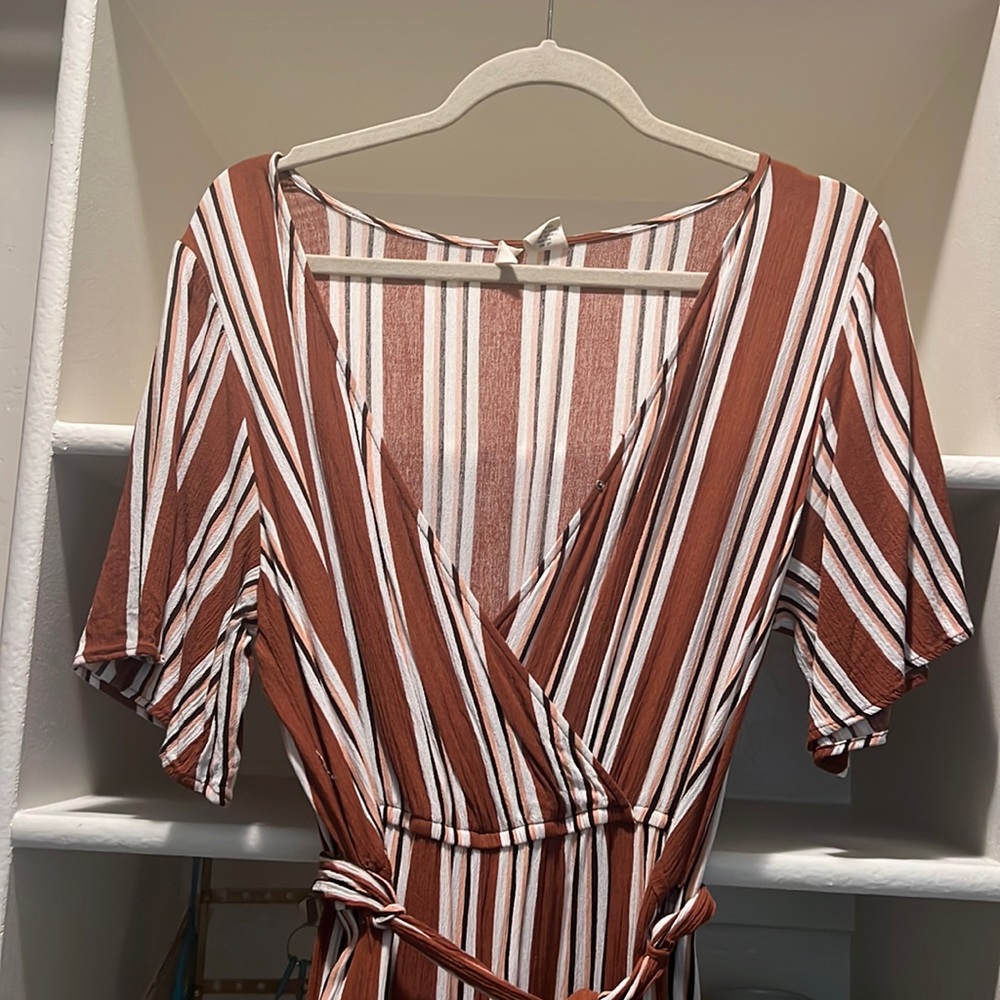 Burn orange, dark brown, and tan jumpsuit